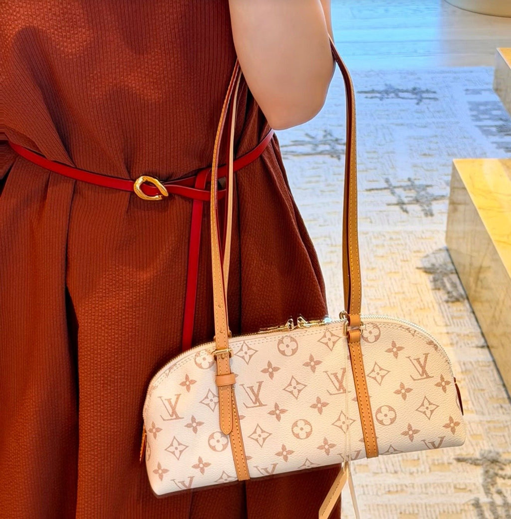 Louis Vuitton Squire East West Monogram Shoulder Bag — model
