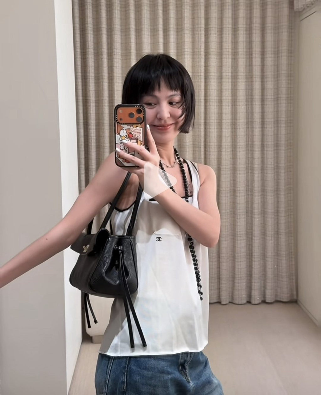 Chanel Quilted Baguette Shoulder Bag — model