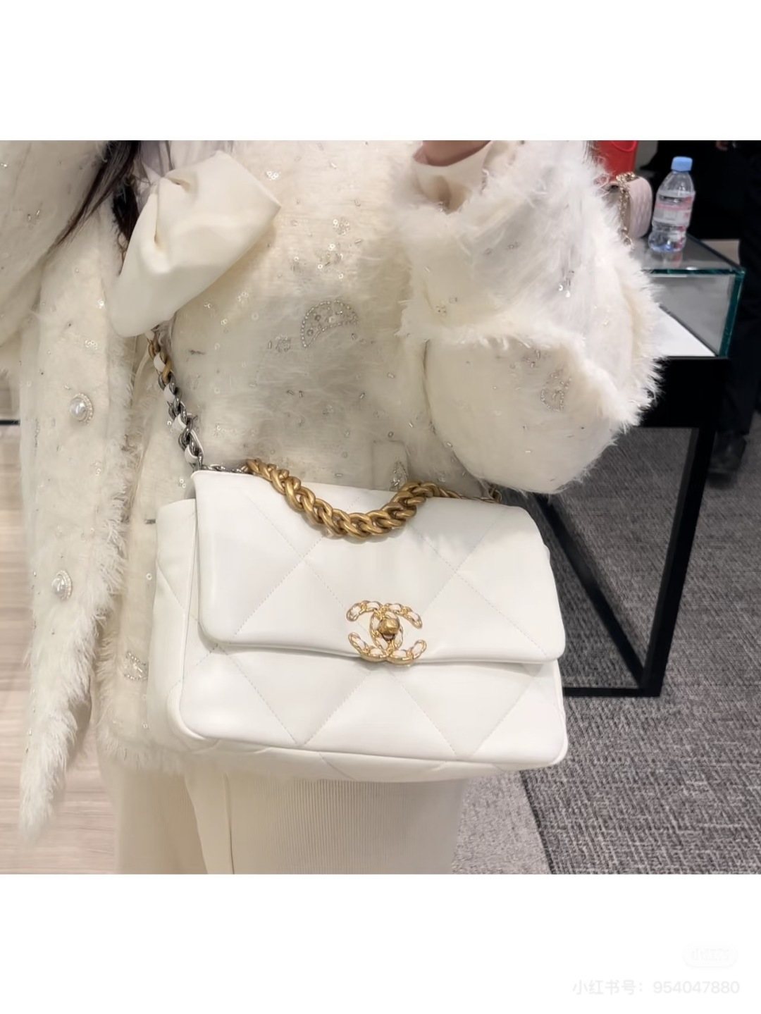 Chanel 19 Diamond-Quilted Flap Shoulder Bag — model