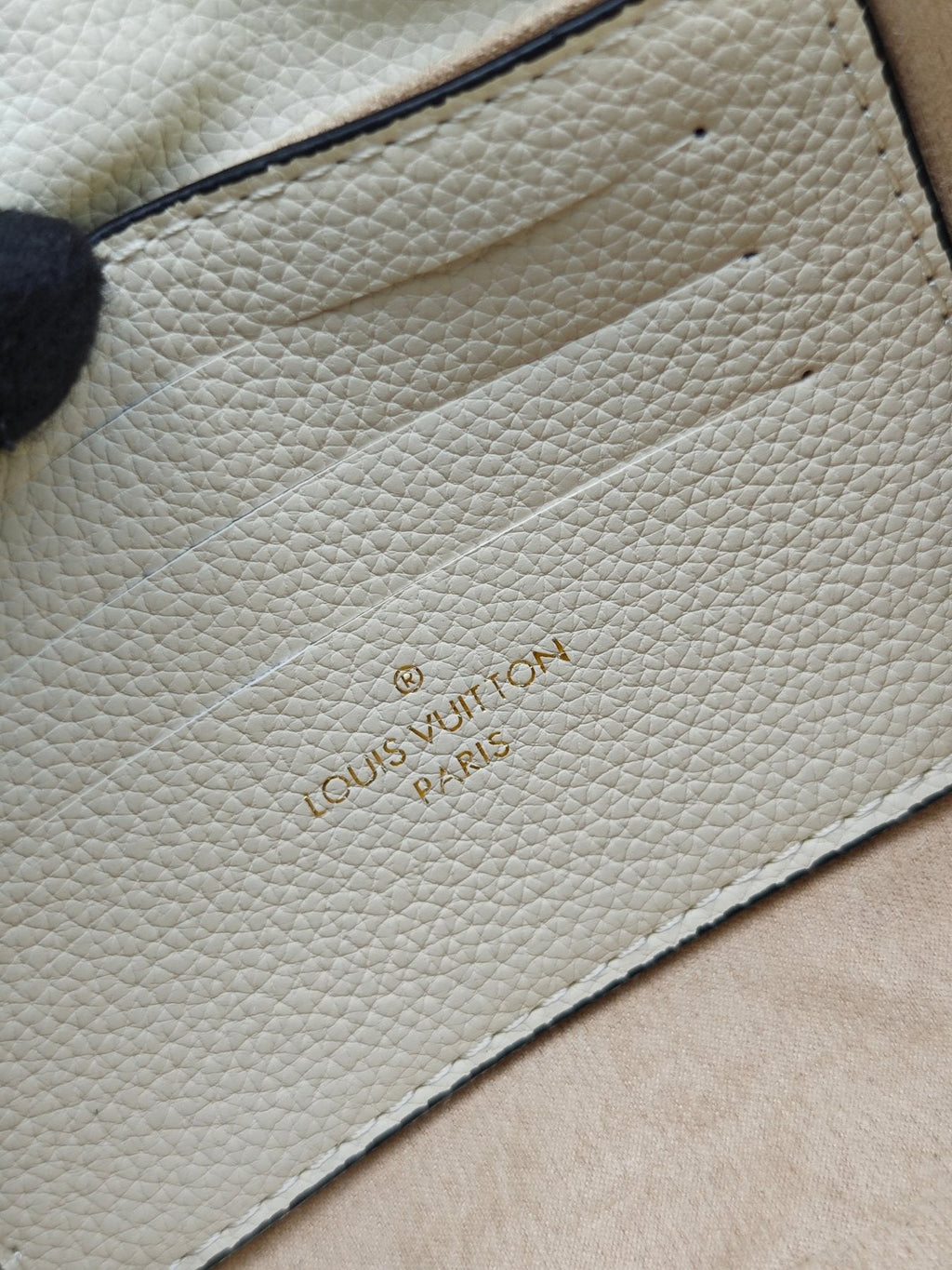 Louis Vuitton Nano Madeleine Monogram Empreinte Handbag — label
