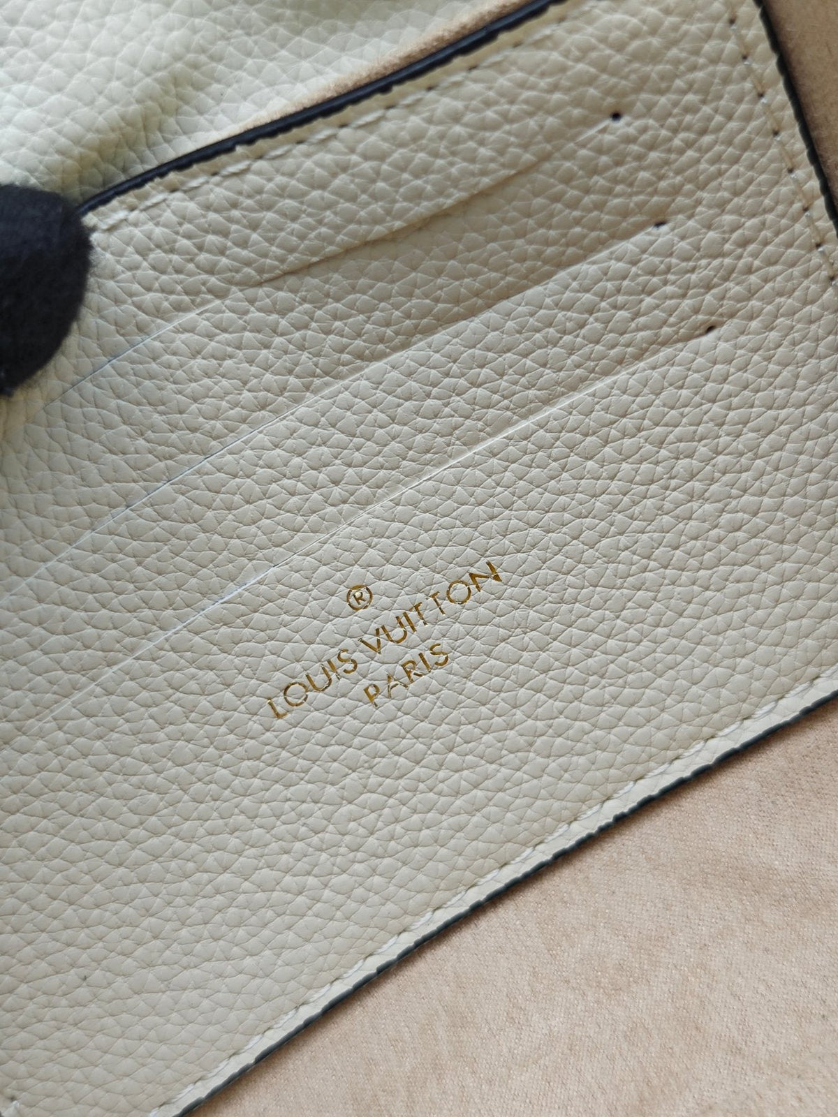 Louis Vuitton Nano Madeleine Monogram Empreinte Handbag — label