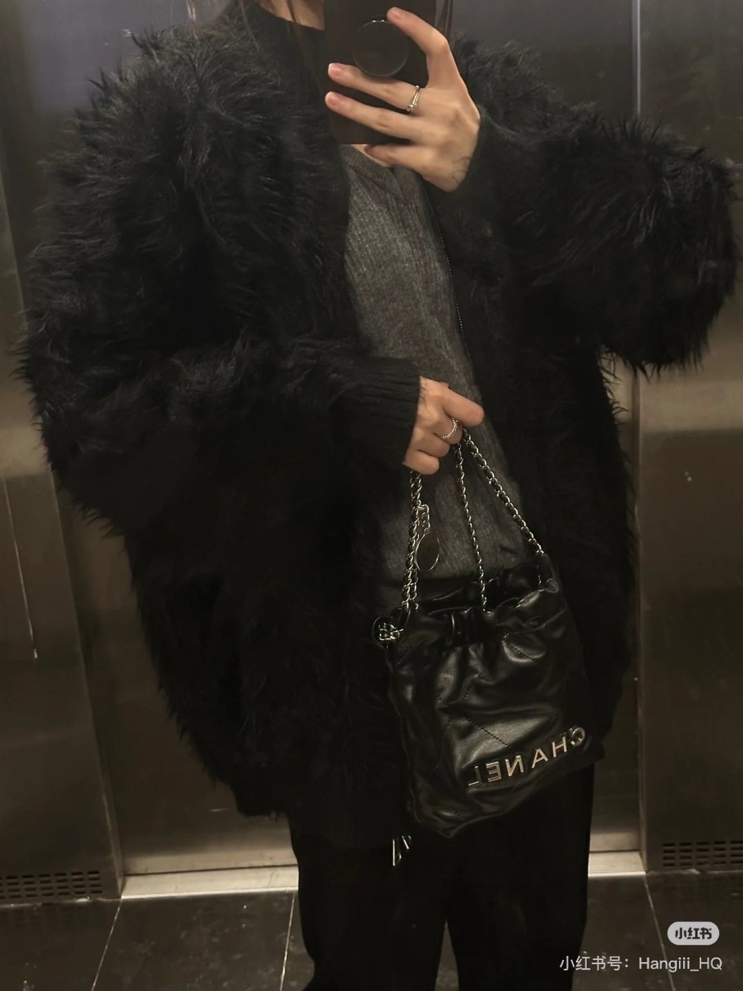 Chanel Mini 22 Quilted Chain Shoulder Bag — model