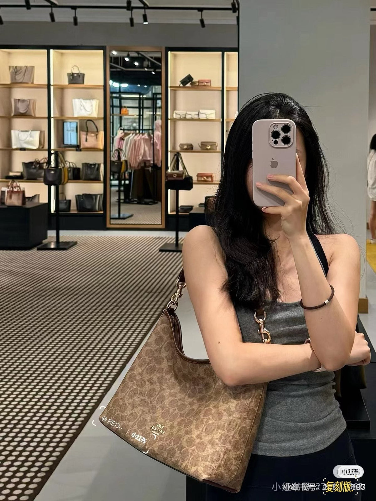 Coach Laurel Signature Print Hobo Bag — model