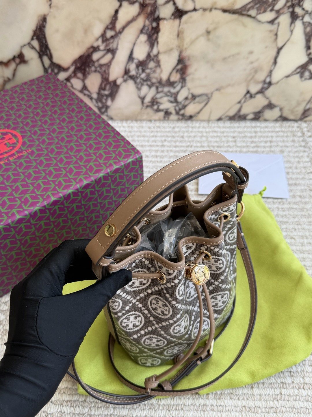 Circular Motif Drawstring Bucket Bag — front