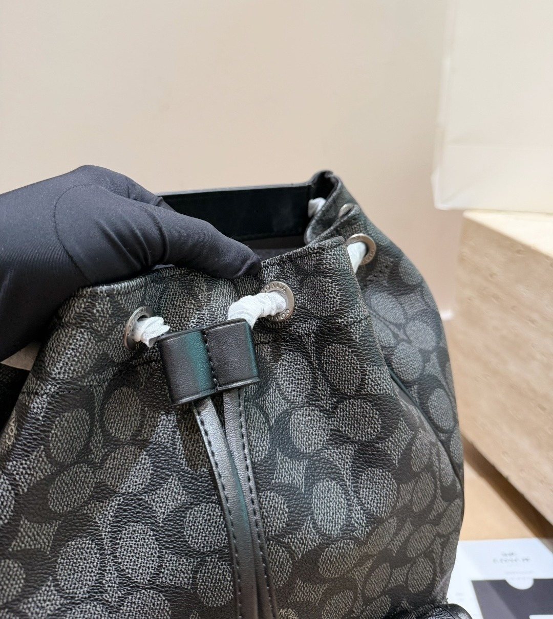 Coach Twin-Buckle Drawstring Backpack — detail