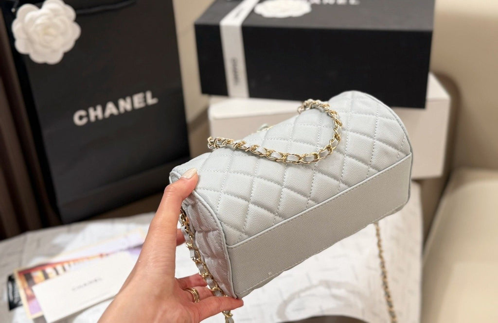 Chanel Quilted Bowling Bag with Jeweled CC Emblem — detail