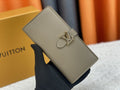 Louis Vuitton Vertical Grained Leather Wallet — hero
