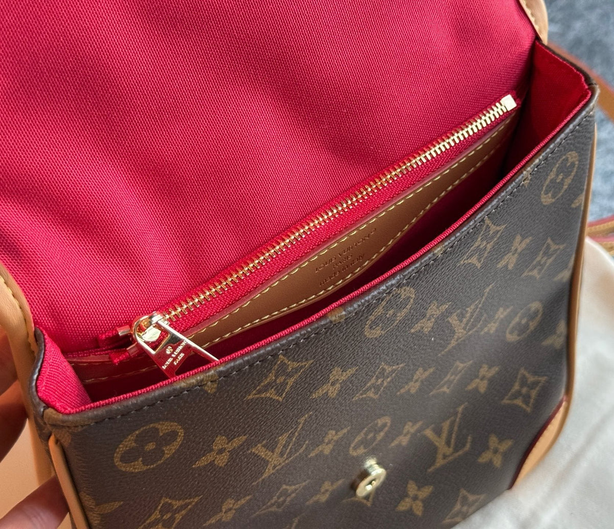 Louis Vuitton Monogram Curved-Flap Backpack — detail