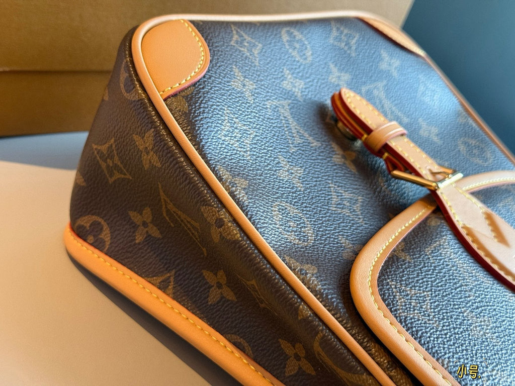 Louis Vuitton Monogram Curved-Flap Backpack — detail