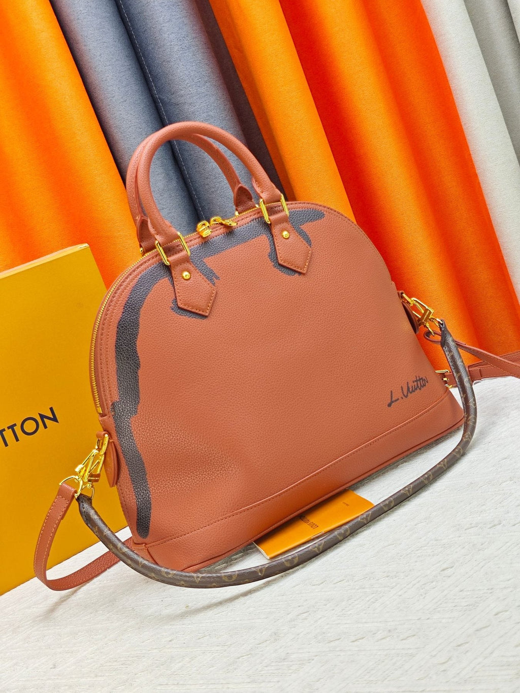 Louis Vuitton Alma Soft Cognac Top-Handle Bag — front