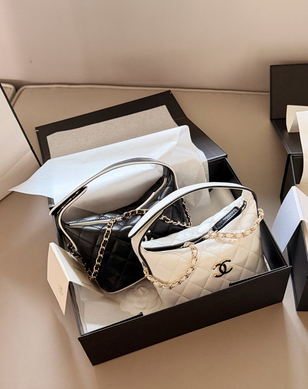 Chanel Quilted Box Top-Handle Bag — comparison
