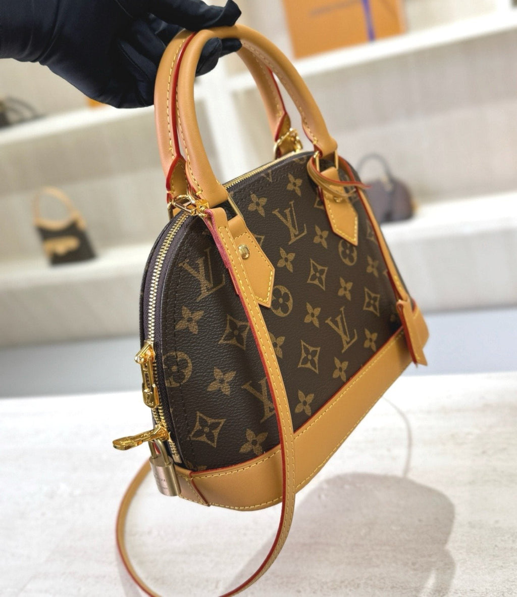 Louis Vuitton Domed Top-Handle Bag — side