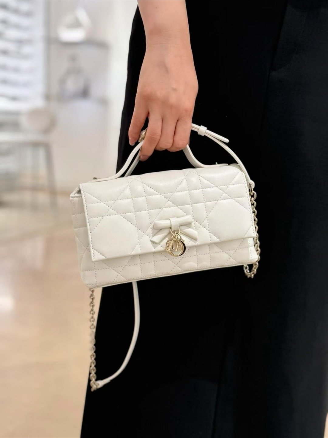Dior Quilted Bow Top-Handle Chain Bag — model