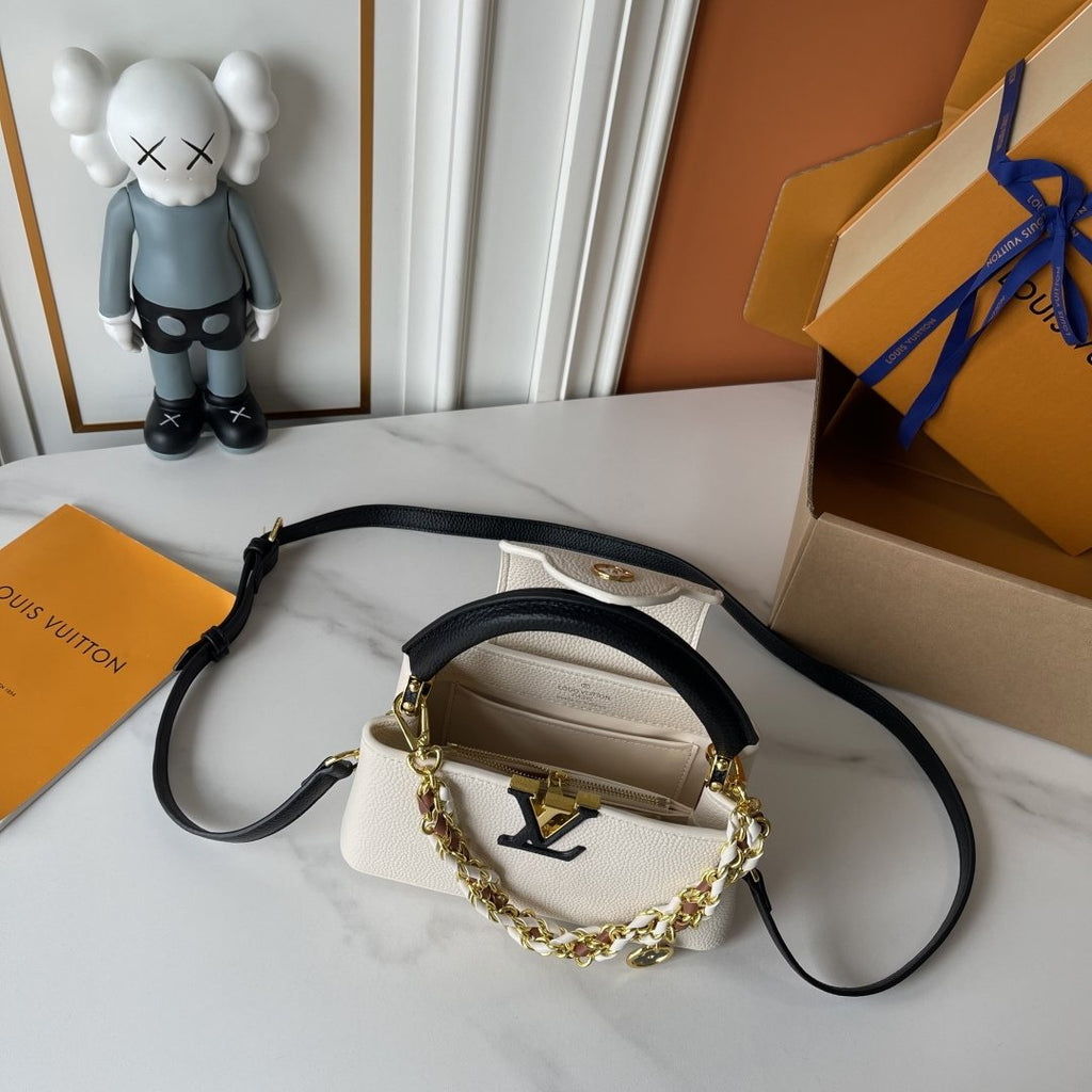 Louis Vuitton Capucines East West Floral Chain Handbag — detail