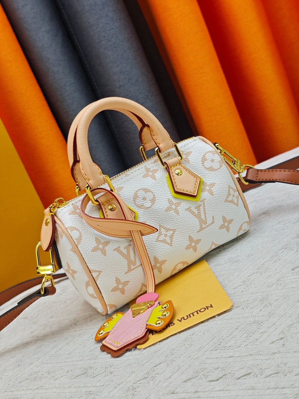 Louis Vuitton Nano Speedy Monogram Dune Mini Bag — front