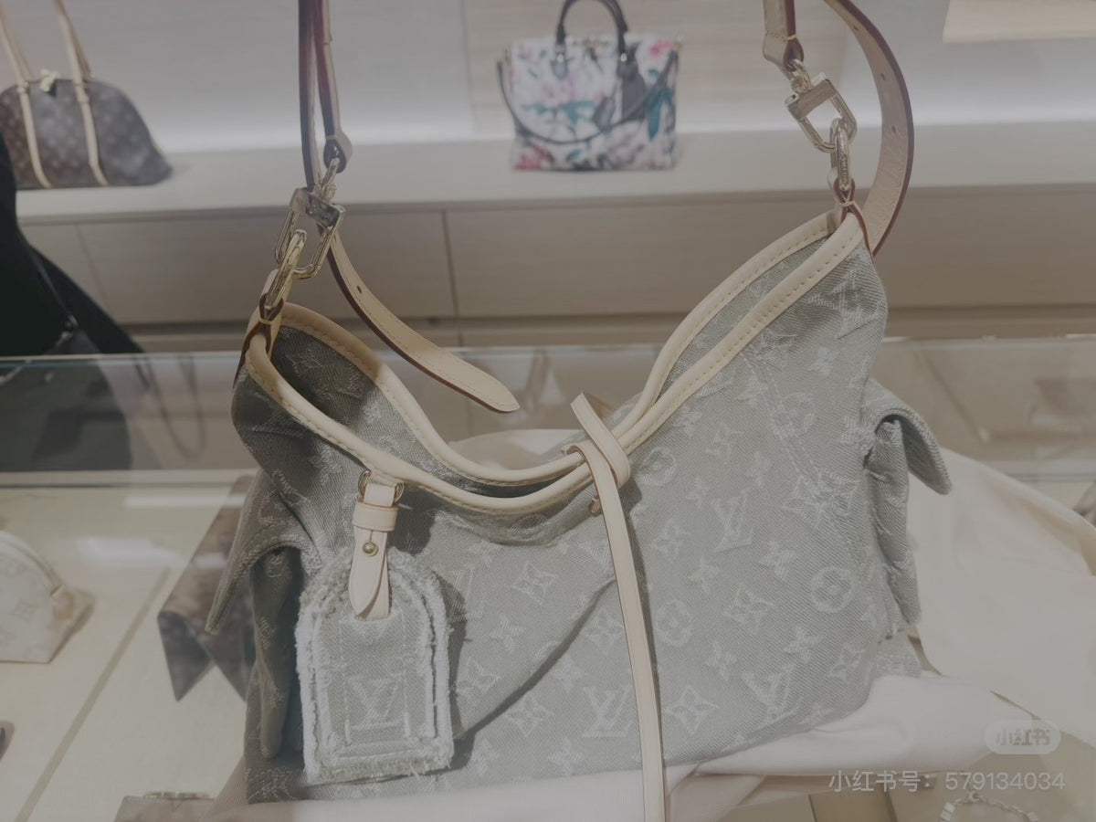 Louis Vuitton Carryall Cargo Monogram Denim Shoulder Bag — front
