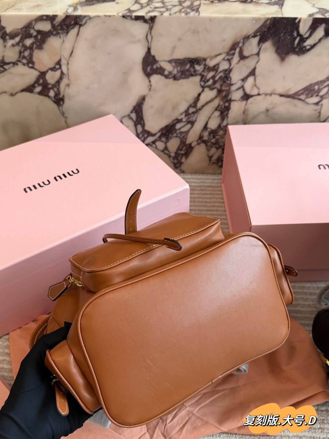 Miu Miu Buckled Flap Backpack — front