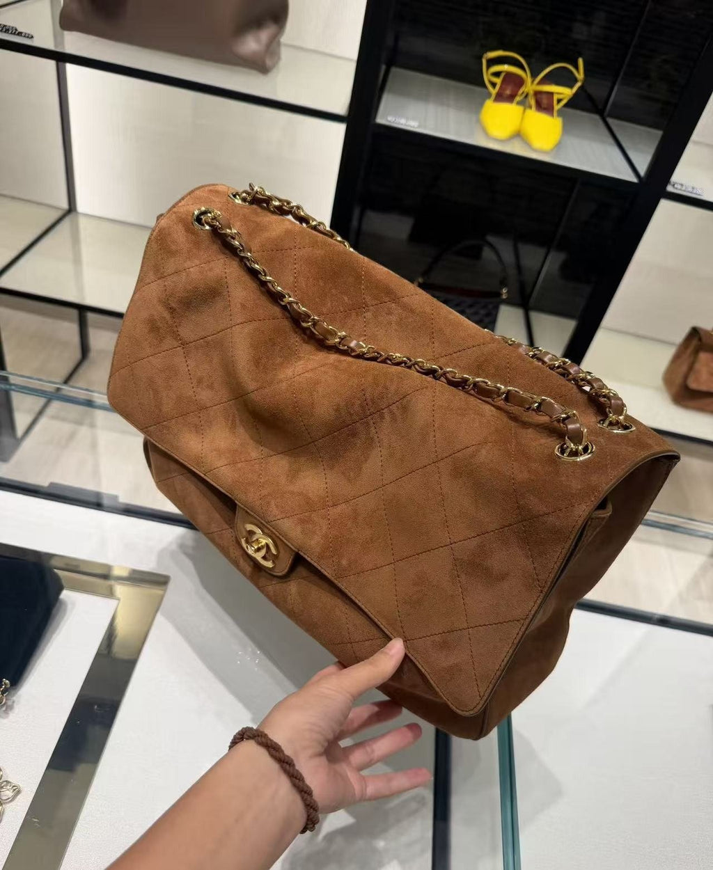 Chanel Maxi Flap Quilted Shoulder Bag — side