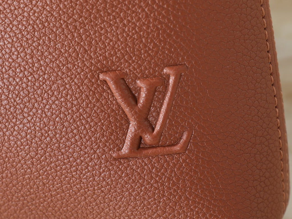 Louis Vuitton Takeoff Leather Wristlet Clutch — detail
