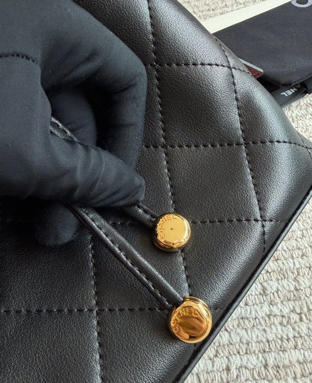 Chanel Diamond-Quilted Drawstring Bucket Bag — detail