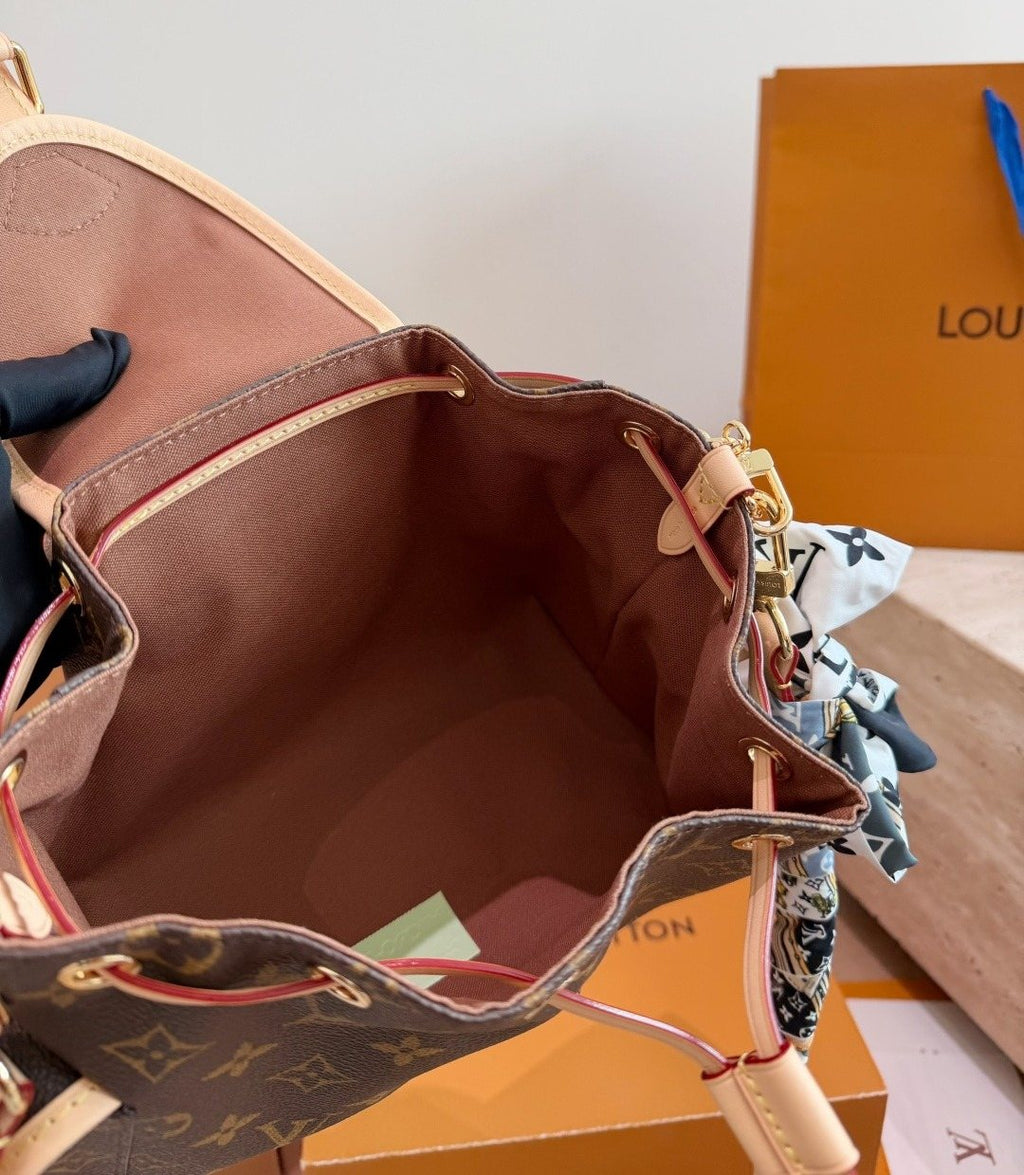 Louis Vuitton Odyssey Monogram Shoulder Bag — detail