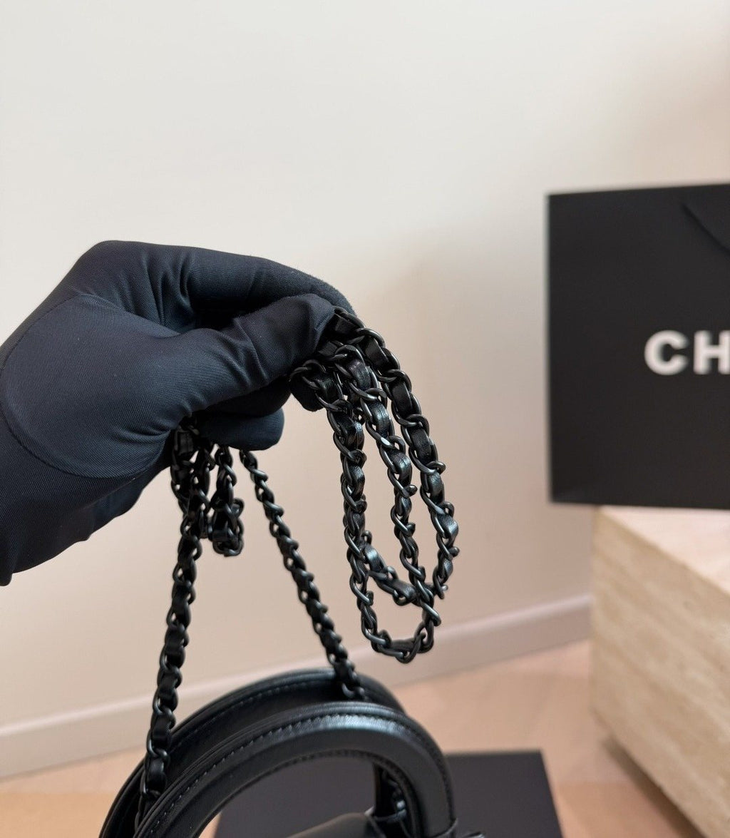 Chanel Kelly Quilted Top-Handle Bag — detail