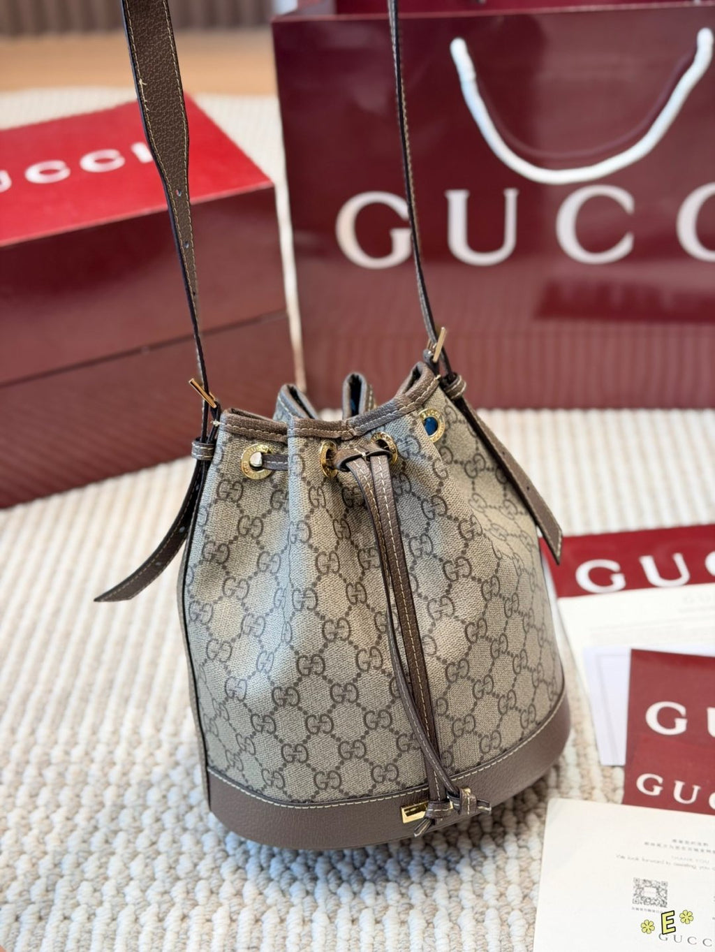 Gucci Monogram Drawstring Bucket Bag — front